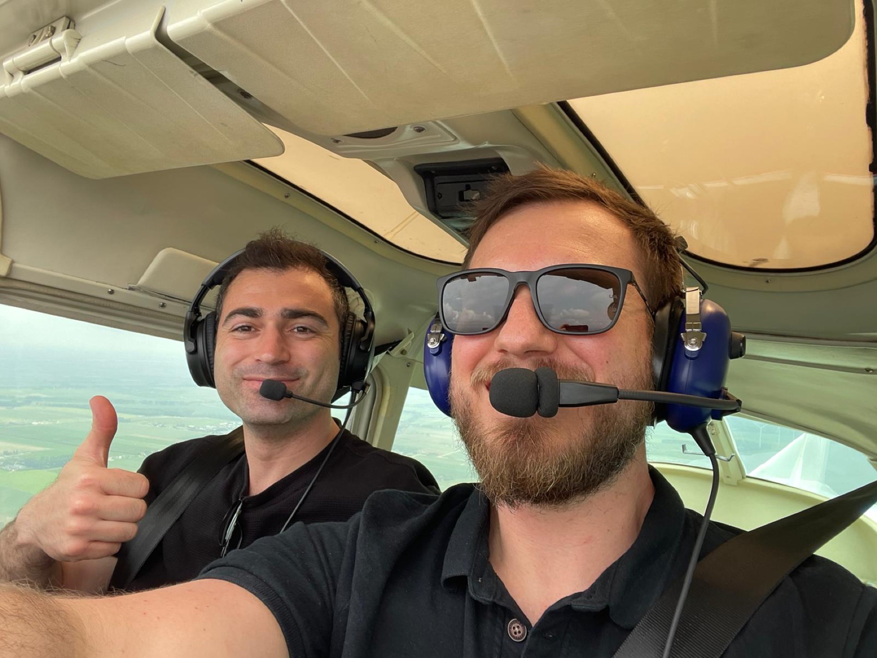 Pilot and student in an aircraft cockpit